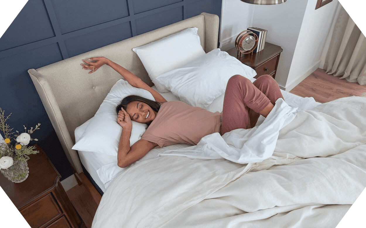 SF girl laying in bed