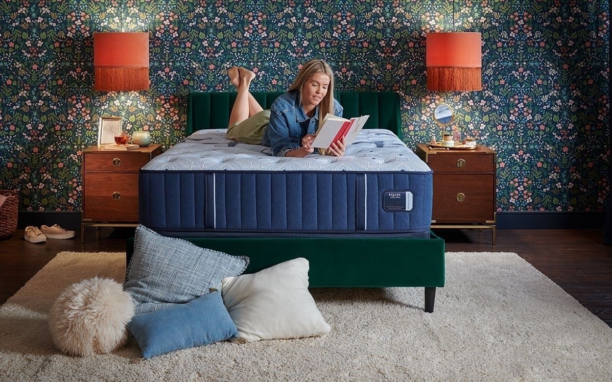 Woman Reading on an Estate mattress